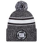 New York Giants mens new era heather black new york giants 2023 inspire change cuffed knit hat with pom | Giants Shop