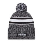 New York Giants mens new era heather black new york giants 2023 inspire change cuffed knit hat with pom | Giants Shop